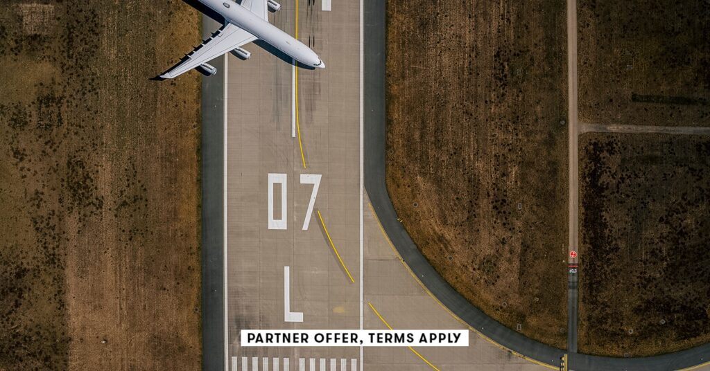 Present Delta American Specific bank card welcome bonuses 20250715 social disclaimer parter offer terms apply birds eye view of airplane parked on airport run.jpeg
