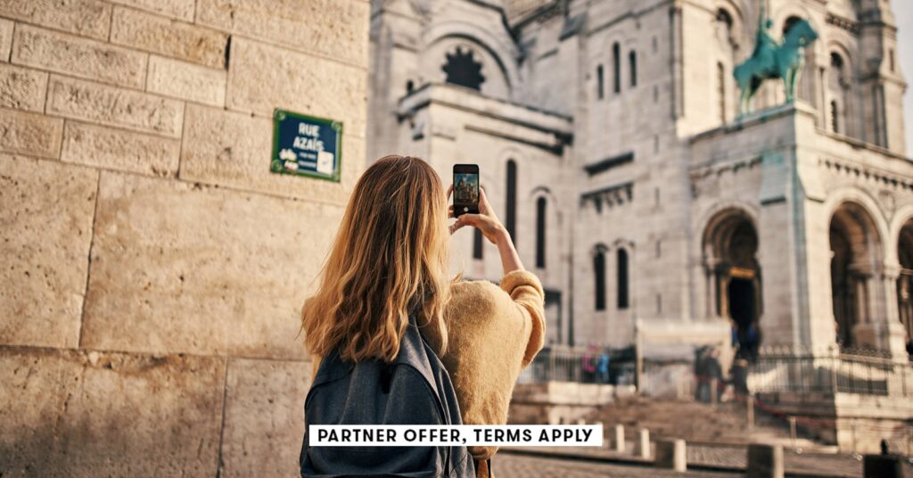 Chase Sapphire Most well-liked vs. Chase Sapphire Reserve 20250715 social disclaimer parter offer terms apply tourist taking photo with smart phone in paris p.jpeg