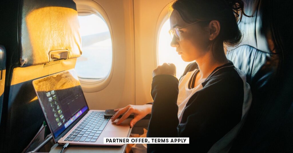 social image partner offer terms apply woman working with laptop in the airplane oleh slobodeniuk 24.jpeg