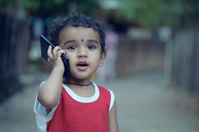 kids with cell phone.jpg