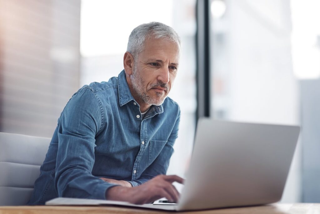 The Hidden Price of Roth Conversions No One Talks About Till It is Too Overdue urlhttps3a2f2fg.foolcdn.com2feditorial2fimages2f8655062folder man laptop a person at a lapt.jpeg