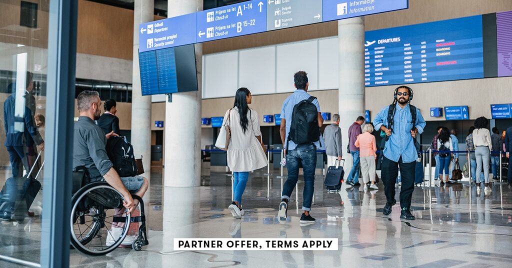 20250715 social disclaimer parter offer terms apply people walking towards check in counter at airpo.jpeg