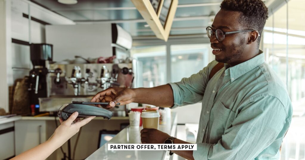social image partner offer terms apply young man paying for coffee milko 20.jpg