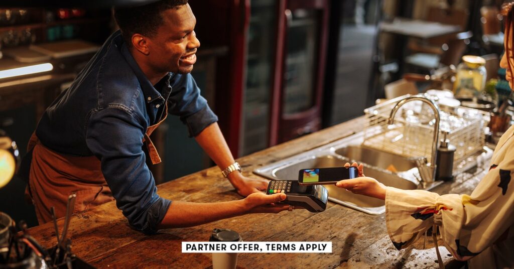 5 forms of bank cards you almost certainly shouldn’t have social image partner offers terms apply bartender holding contactless payment terminal for person to.jpeg