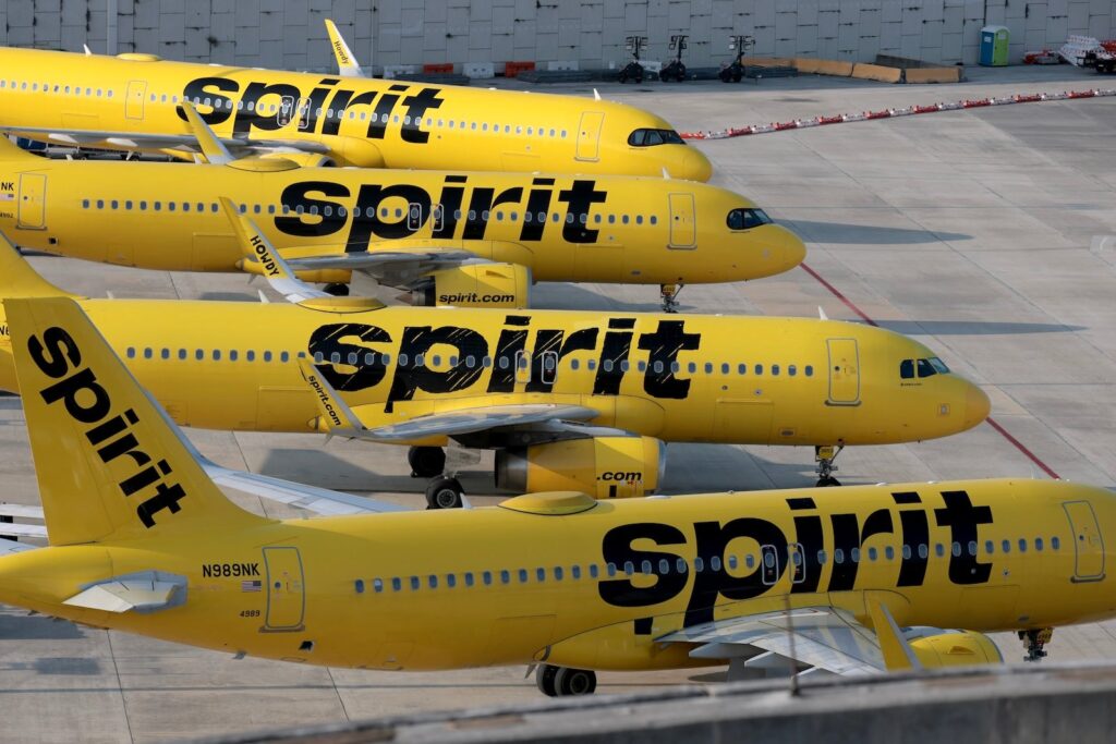 Spirit Airways offers replace on passenger refunds, issues, vouchers spirit planes parked fll.jpg