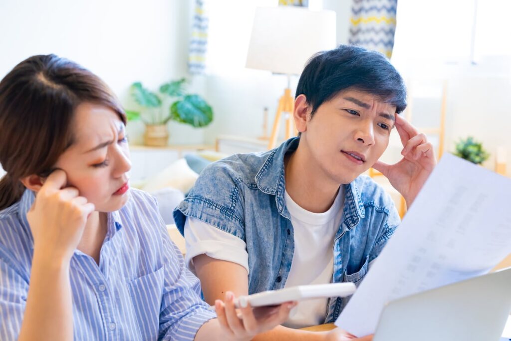 Higher Dividend Inventory: AGNC Funding vs. Realty Source of revenue urlhttps3a2f2fg.foolcdn.com2feditorial2fimages2f8683462f21 05 19 two people looking at pape.jpeg