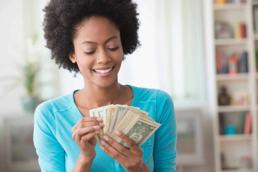 woman counting money scaled.webp.webp